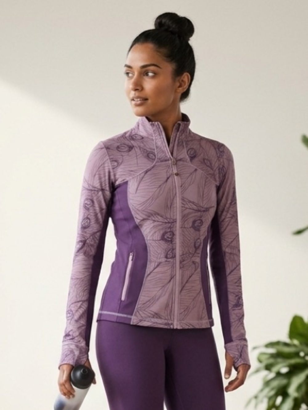 RARE Lululemon Define jacket in purple with a peacock feather design